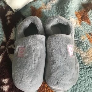 Grey warm slippers. Size 8. Very Comfortable. With hard soles.